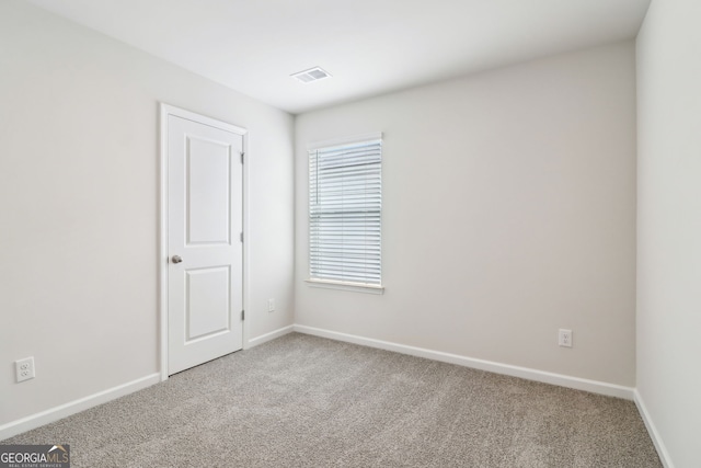 2762 Aralynn Way, College Park, GA 30337 - carpeted empty room featuring visible vents and baseboards