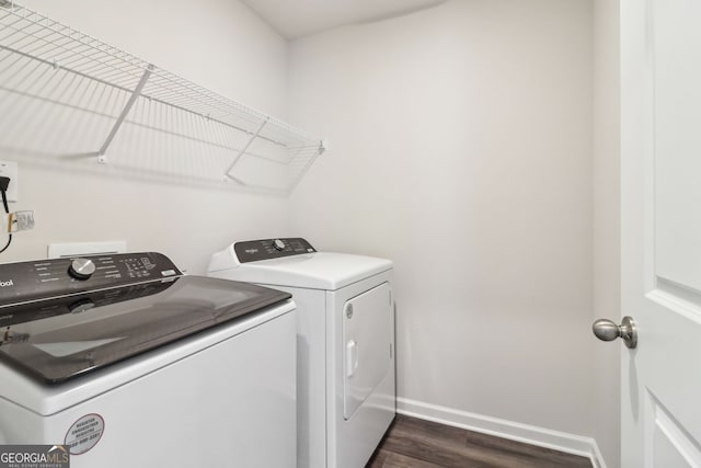 2762 Aralynn Way, College Park, GA 30337 - washroom with laundry area, dark wood finished floors, baseboards, and washing machine and clothes dryer