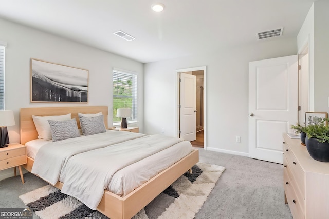 2762 Aralynn Way, College Park, GA 30337 - bedroom with baseboards, light carpet, and visible vents