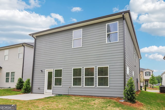 2762 Aralynn Way, College Park, GA 30337 - back of property with a yard, a patio area, and central AC