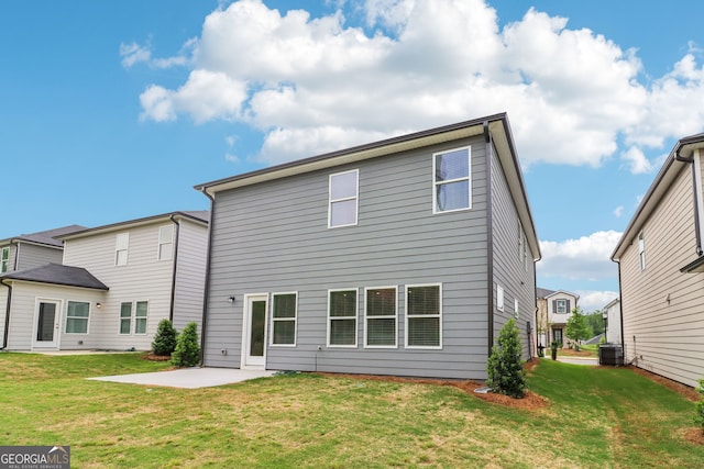 2762 Aralynn Way, College Park, GA 30337 - back of property featuring a lawn, a patio area, and cooling unit