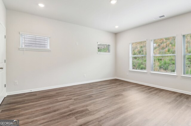 2762 Aralynn Way, College Park, GA 30337 - spare room with recessed lighting, baseboards, visible vents, and wood finished floors