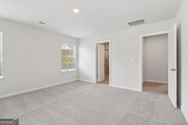 2764 Aralynn Way, College Park, GA 30337 - unfurnished bedroom featuring baseboards, recessed lighting, visible vents, and light colored carpet
