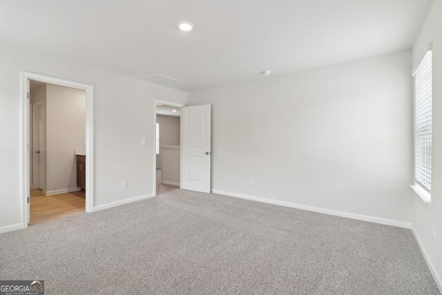 2764 Aralynn Way, College Park, GA 30337 - unfurnished bedroom featuring carpet flooring, ensuite bath, baseboards, and recessed lighting