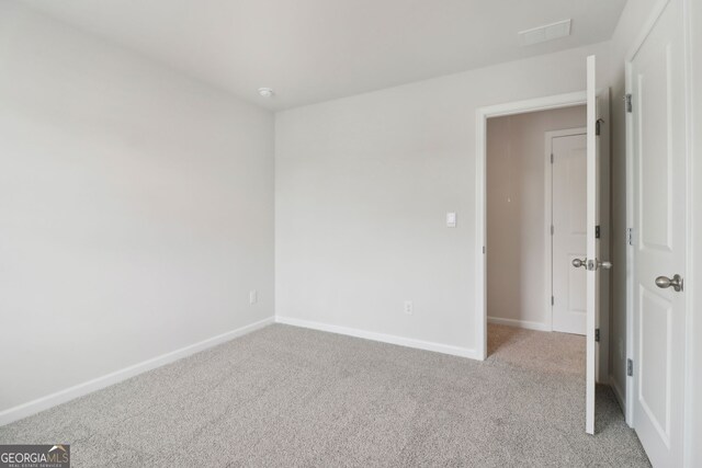2764 Aralynn Way, College Park, GA 30337 - unfurnished room featuring baseboards, visible vents, and light colored carpet