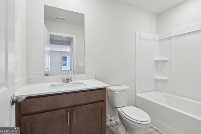 2764 Aralynn Way, College Park, GA 30337 - full bathroom featuring toilet, visible vents, baseboards, and vanity