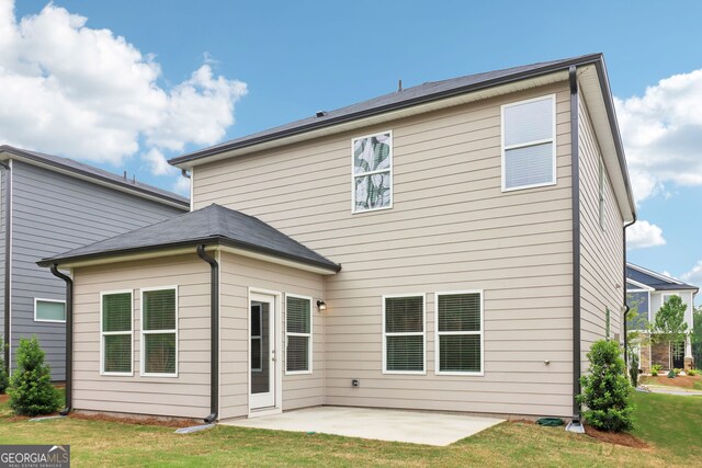 2764 Aralynn Way, College Park, GA 30337 - back of property featuring a patio area and a lawn