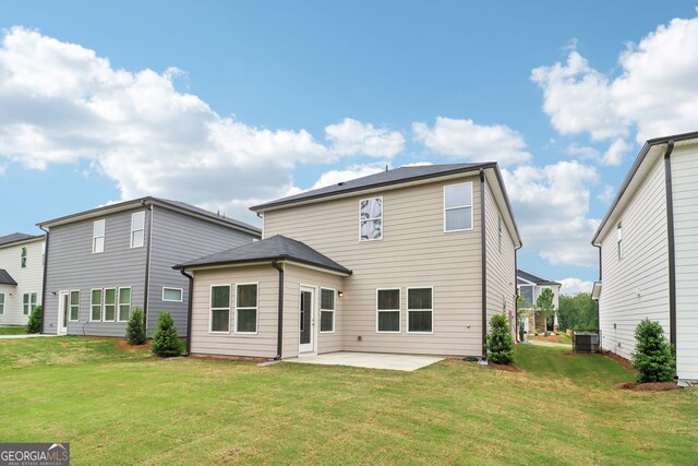 2764 Aralynn Way, College Park, GA 30337 - rear view of house with a yard, a patio, and central AC