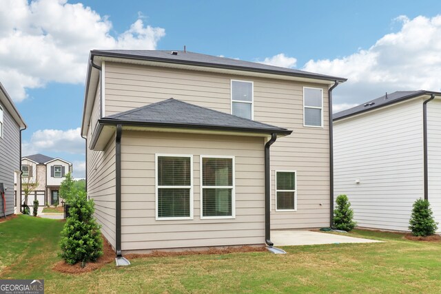 2764 Aralynn Way, College Park, GA 30337 - rear view of house with a yard and a patio area