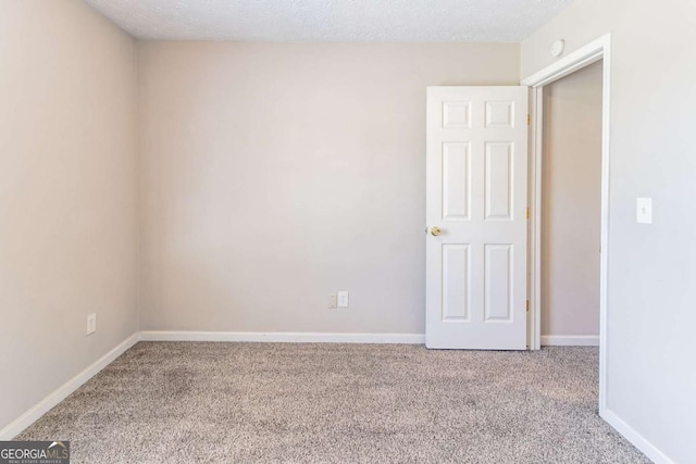 805 Old Rocky Rd, Atlanta, GA 30349 - unfurnished room featuring baseboards and carpet