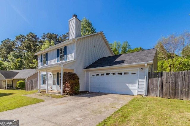 805 Old Rocky Rd, Atlanta, GA 30349 - traditional-style home featuring a chimney, a front lawn, driveway, fence, and a garage