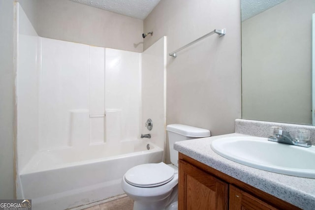 805 Old Rocky Rd, Atlanta, GA 30349 - bathroom with a textured ceiling, toilet, vanity, and bathtub / shower combination