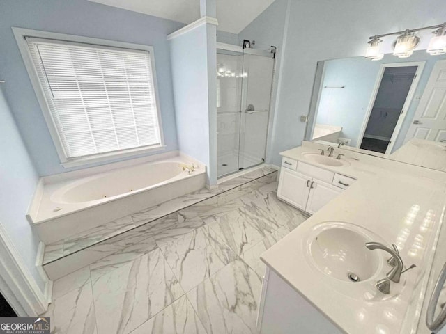 bathroom with a shower stall, a sink, marble finish floor, double vanity, and a jetted tub