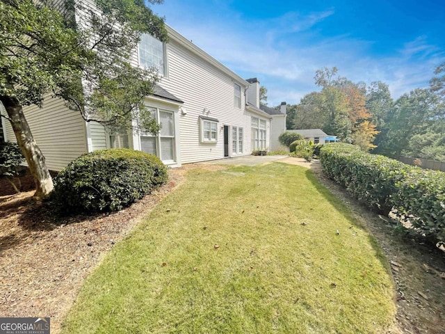 exterior space with a lawn