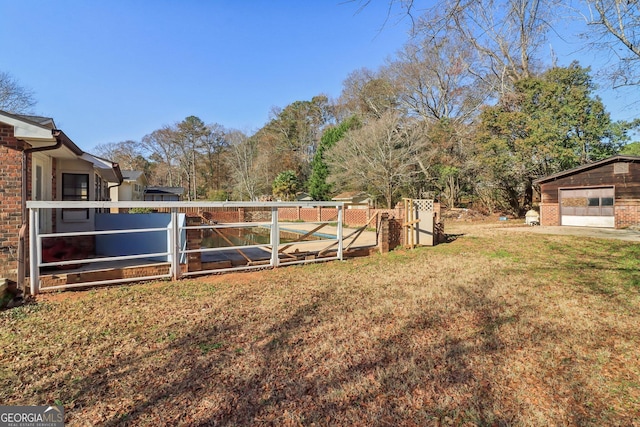 view of yard with a garage