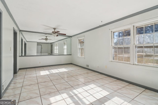 unfurnished room featuring light tile patterned floors, ornamental molding, baseboards, and ceiling fan