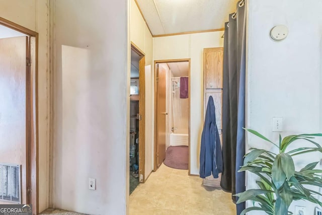 hallway featuring visible vents
