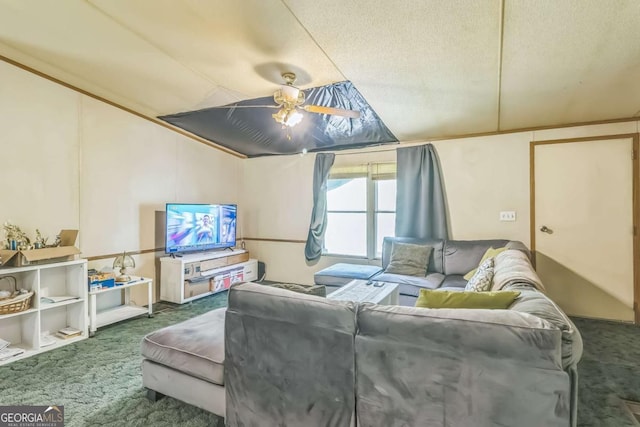 carpeted living room featuring a textured ceiling and a ceiling fan