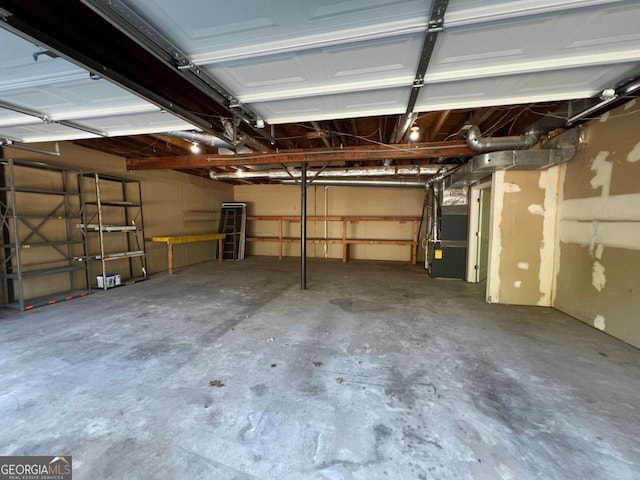 garage featuring heating unit