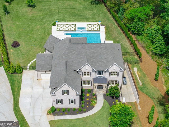 view of subject property featuring a pool area