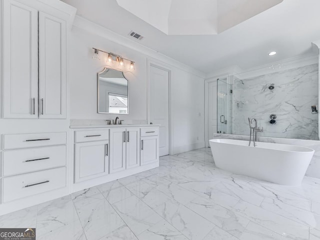 full bath featuring marble finish flooring, a marble finish shower, a freestanding bath, vanity, and recessed lighting