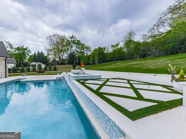 view of pool featuring a pool with connected hot tub