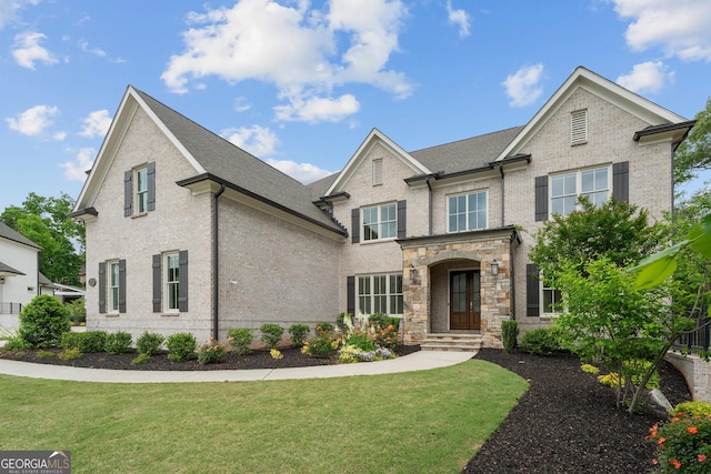 2535 Lake View Ct, Milton, GA 30004 - view of front of property with a front yard, brick siding, and roof with shingles