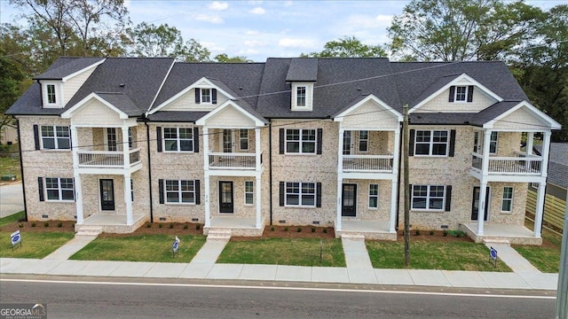 323 S Madison Ave, Monroe, GA 30655 - multi unit property with a balcony, crawl space, and a front lawn