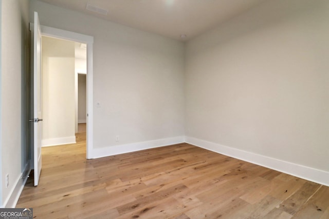 117 Wildwood Dr, Eatonton, GA 31024 - spare room with visible vents, light wood-style flooring, and baseboards