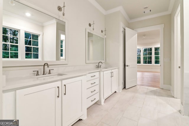 117 Wildwood Dr, Eatonton, GA 31024 - full bath featuring ornamental molding, a sink, and double vanity
