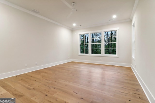 117 Wildwood Dr, Eatonton, GA 31024 - unfurnished room featuring crown molding, light wood-style floors, baseboards, visible vents, and recessed lighting