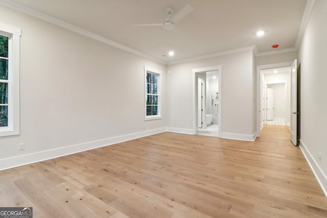 117 Wildwood Dr, Eatonton, GA 31024 - spare room with ceiling fan, ornamental molding, and light wood-style floors