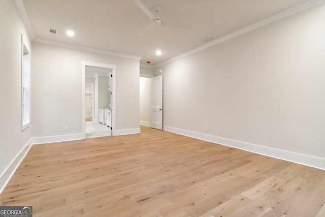 117 Wildwood Dr, Eatonton, GA 31024 - unfurnished bedroom with light wood finished floors, baseboards, visible vents, and crown molding