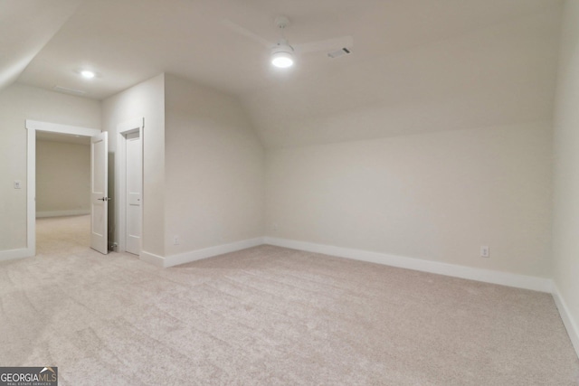 117 Wildwood Dr, Eatonton, GA 31024 - bonus room with lofted ceiling, carpet floors, and baseboards