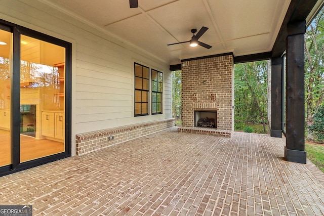 117 Wildwood Dr, Eatonton, GA 31024 - view of patio featuring ceiling fan and an outdoor brick fireplace