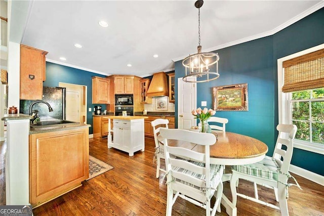 204 Overland Trl, Mcdonough, GA 30252 - dining space featuring an inviting chandelier, dark wood finished floors, baseboards, ornamental molding, and recessed lighting