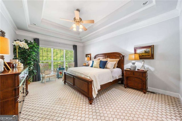 204 Overland Trl, Mcdonough, GA 30252 - bedroom featuring light colored carpet, a raised ceiling, and crown molding