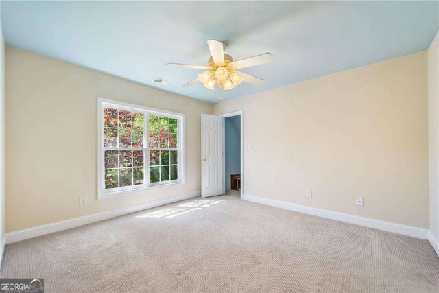 204 Overland Trl, Mcdonough, GA 30252 - empty room featuring baseboards, carpet, and ceiling fan