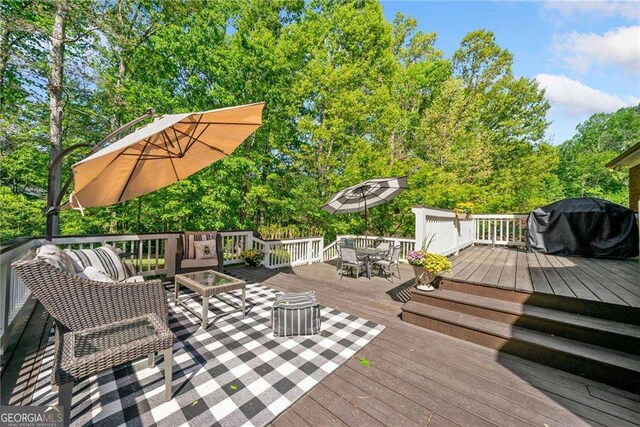 204 Overland Trl, Mcdonough, GA 30252 - wooden deck featuring grilling area and outdoor dining space