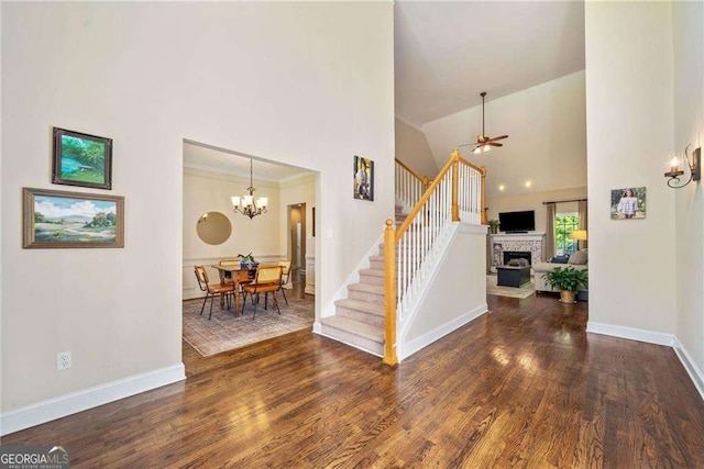 204 Overland Trl, Mcdonough, GA 30252 - interior space featuring high vaulted ceiling, baseboards, wood finished floors, and stairs