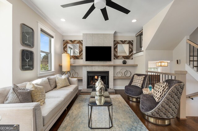 738 Saint Charles Ave NE, Atlanta, GA 30306 - living area with ceiling fan, ornamental molding, wood finished floors, and a fireplace