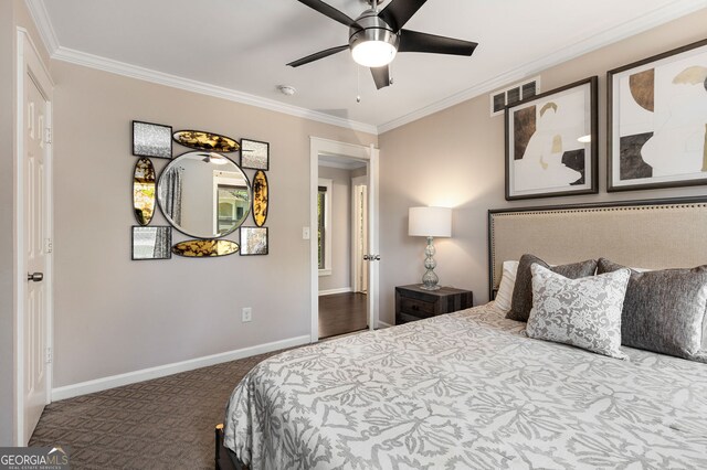 738 Saint Charles Ave NE, Atlanta, GA 30306 - carpeted bedroom with visible vents, crown molding, a ceiling fan, and baseboards