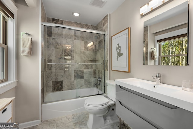 738 Saint Charles Ave NE, Atlanta, GA 30306 - full bath with visible vents, marble finish floor, vanity, and toilet