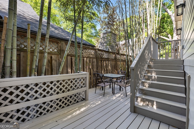 738 Saint Charles Ave NE, Atlanta, GA 30306 - wooden terrace featuring fence, stairs, and outdoor dining area