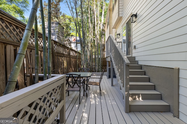 738 Saint Charles Ave NE, Atlanta, GA 30306 - wooden deck featuring stairway and outdoor dining area