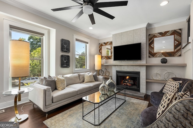 738 Saint Charles Ave NE, Atlanta, GA 30306 - living area featuring recessed lighting, wood finished floors, a ceiling fan, ornamental molding, and a fireplace