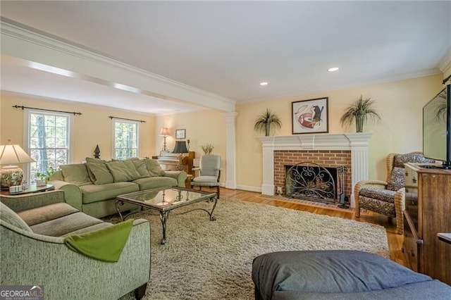 5251 Amberbrook Ct, Marietta, GA 30068 - living area with recessed lighting, wood finished floors, crown molding, baseboards, and a brick fireplace