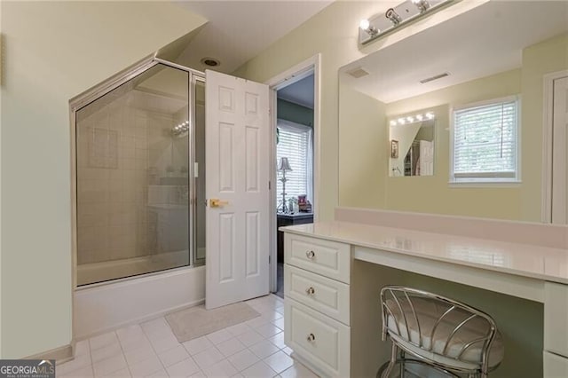5251 Amberbrook Ct, Marietta, GA 30068 - bathroom featuring a healthy amount of sunlight, tile patterned floors, enclosed tub / shower combo, and visible vents