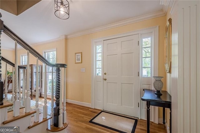 5251 Amberbrook Ct, Marietta, GA 30068 - entrance foyer with baseboards, crown molding, wood finished floors, and stairs