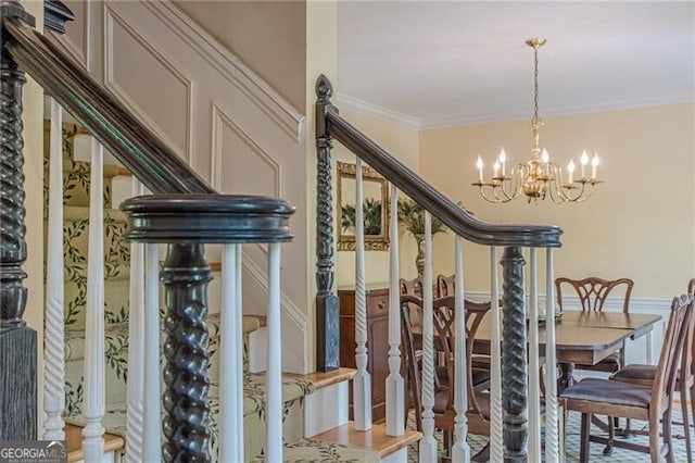 5251 Amberbrook Ct, Marietta, GA 30068 - dining space with a chandelier, stairway, and ornamental molding